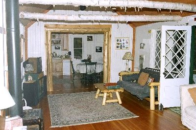 View from Living room to kitchen Adirondack Lake
                Placid New York vacation waterfront lakefront rental
                property house home camp